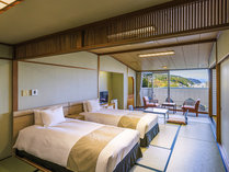【潮香】和室のツインベッドルーム　ベッド×2台とお布団2組